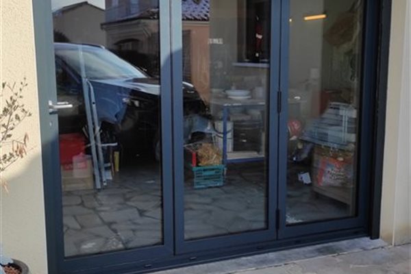 Zoom sur la porte repliable 